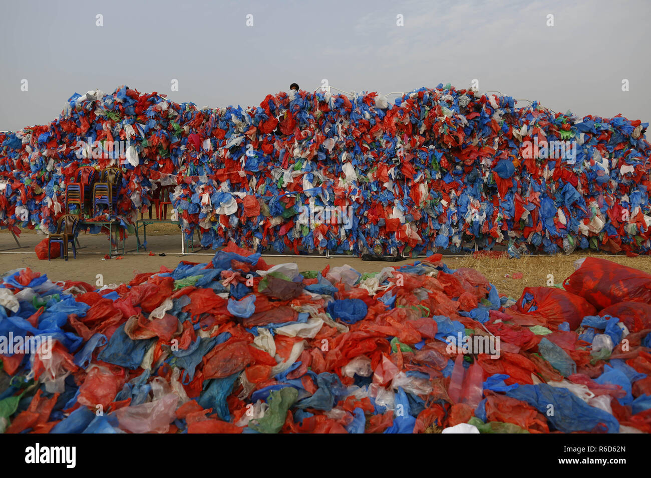 Kathmandu, Nepal. 5th Dec, 2018. Volunteers make the Dead Sea map in an attempt to break the Guinness World Records using the highest number of plastic bags with the slogan ''One Dead Sea is enough for us'' at Tundikhel grounds in Kathmandu, Nepal on Wednesday, December 05, 2018. Credit: Skanda Gautam/ZUMA Wire/Alamy Live News Stock Photo