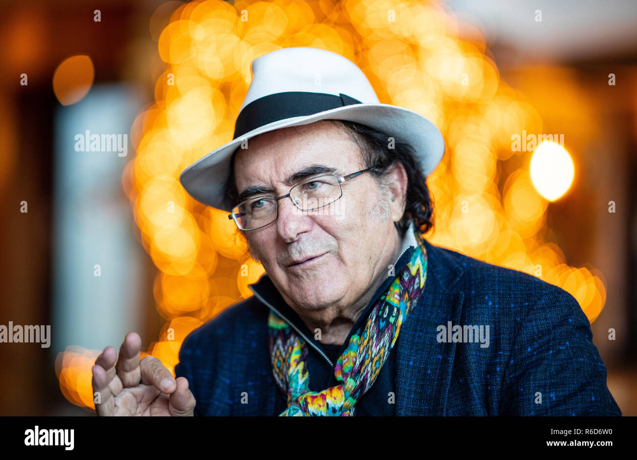 04 December 2018, North Rhine-Westphalia, Dortmund: Al Bano Carrisi sits  during an interview in the lobby of the Dorint Hotel in Dortmund. Al Bano  and Romina Power, dream couple of the Italo-Pop