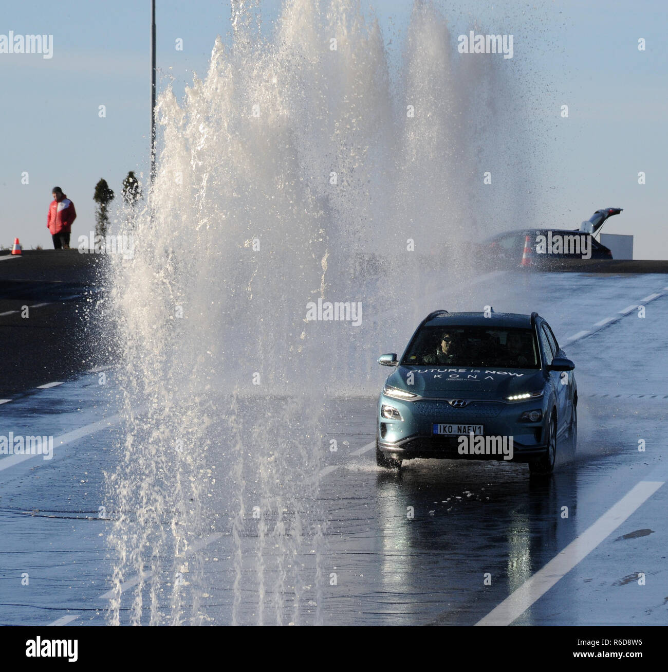 An electric car rides on a test circuit in the Autodrom Most within electric driving courses, on