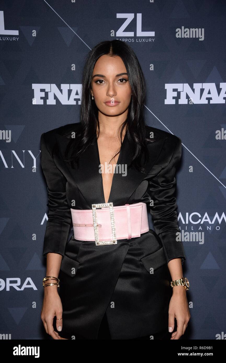 Amina Muaddi at arrivals for 32nd Footwear News FN Achievement Awards, IAC  Headquarters, New York, NY December 4, 2018. Photo By: Eli Winston/Everett  Collection Stock Photo - Alamy