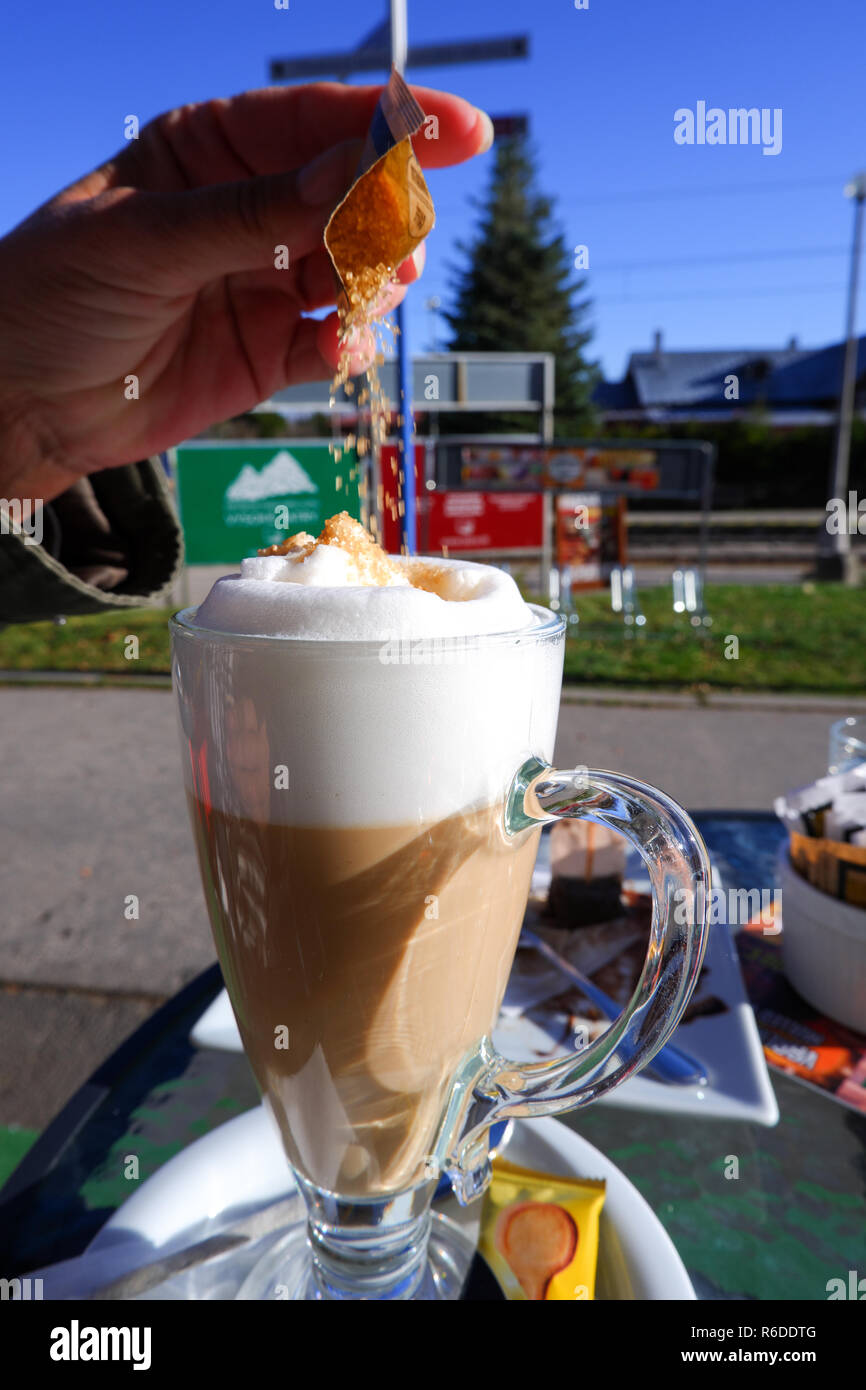 cup cafe latte sweeten cane sugar Stock Photo