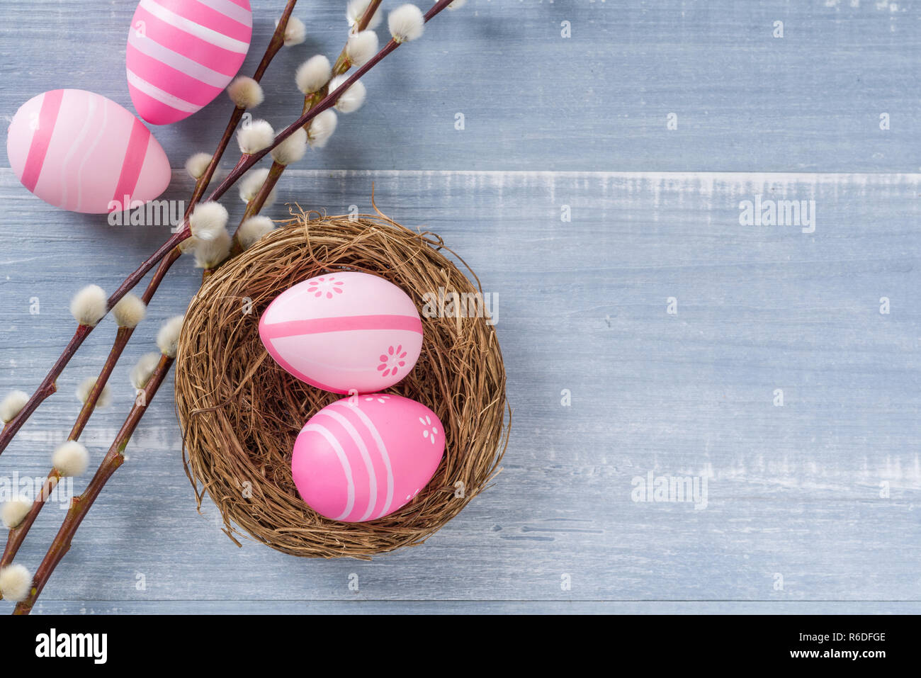 nest with pink easter eggs and copy space Stock Photo - Alamy