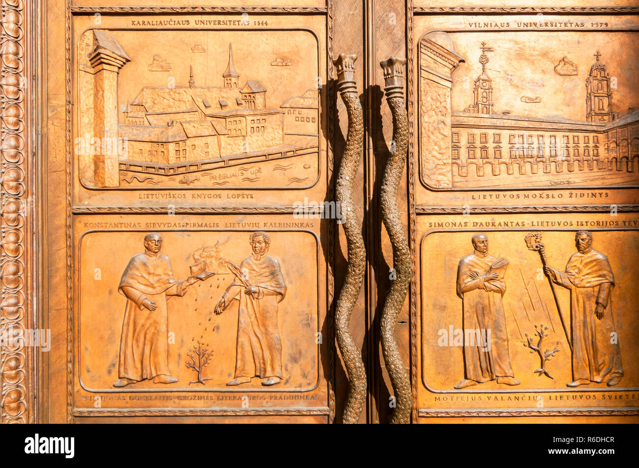 A Bronze Door At The Vilnius University Library Commemorates The First Lithuanian Book Stock Photo