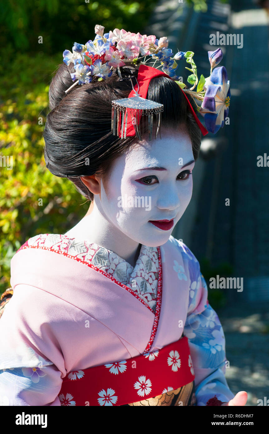 Young Beautiful Japanese Women Called Maiko Wear A Traditional Dress Called  Kimono At Gion, Kyoto, Japan Stock Photo - Alamy
