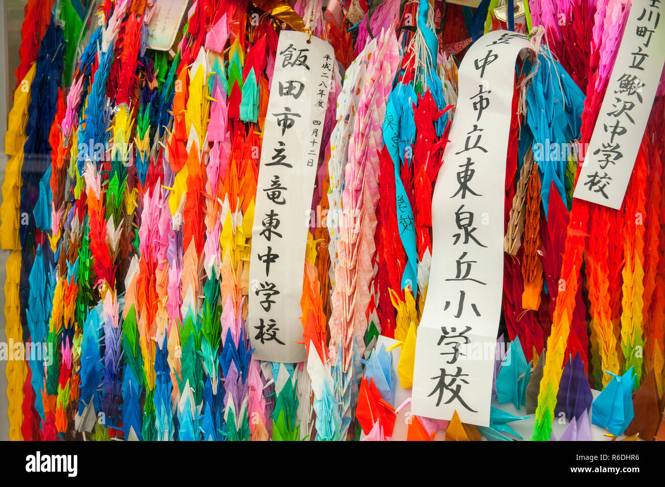 Brightly Colored Origami Paper Cranes At The Memorial Tower To The Mobilized Students This Tower Is Part Of The Hiroshima Peace Memorial In Hiroshima, Stock Photo