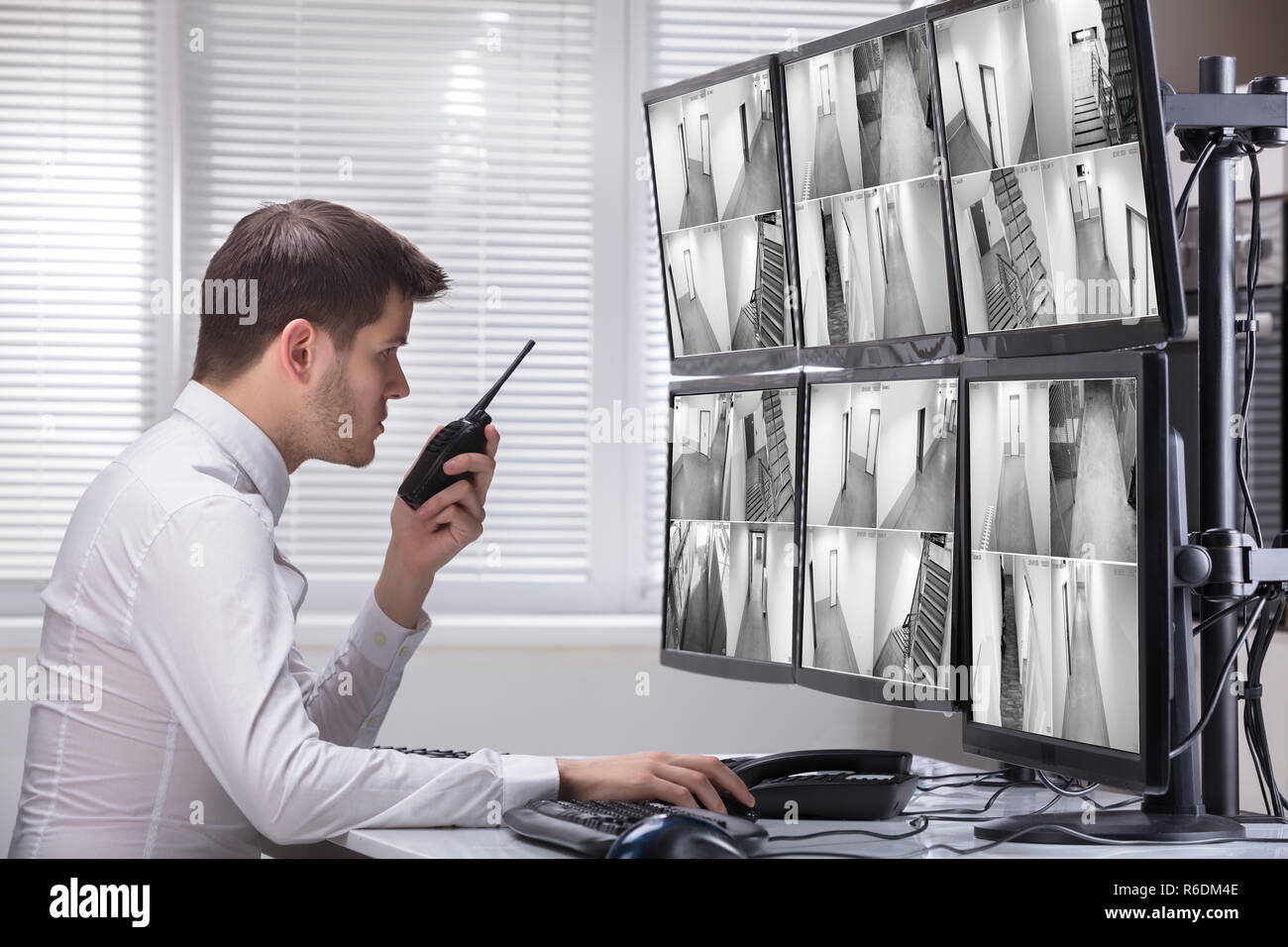 Security Guard Monitoring CCTV Footage Stock Photo Alamy