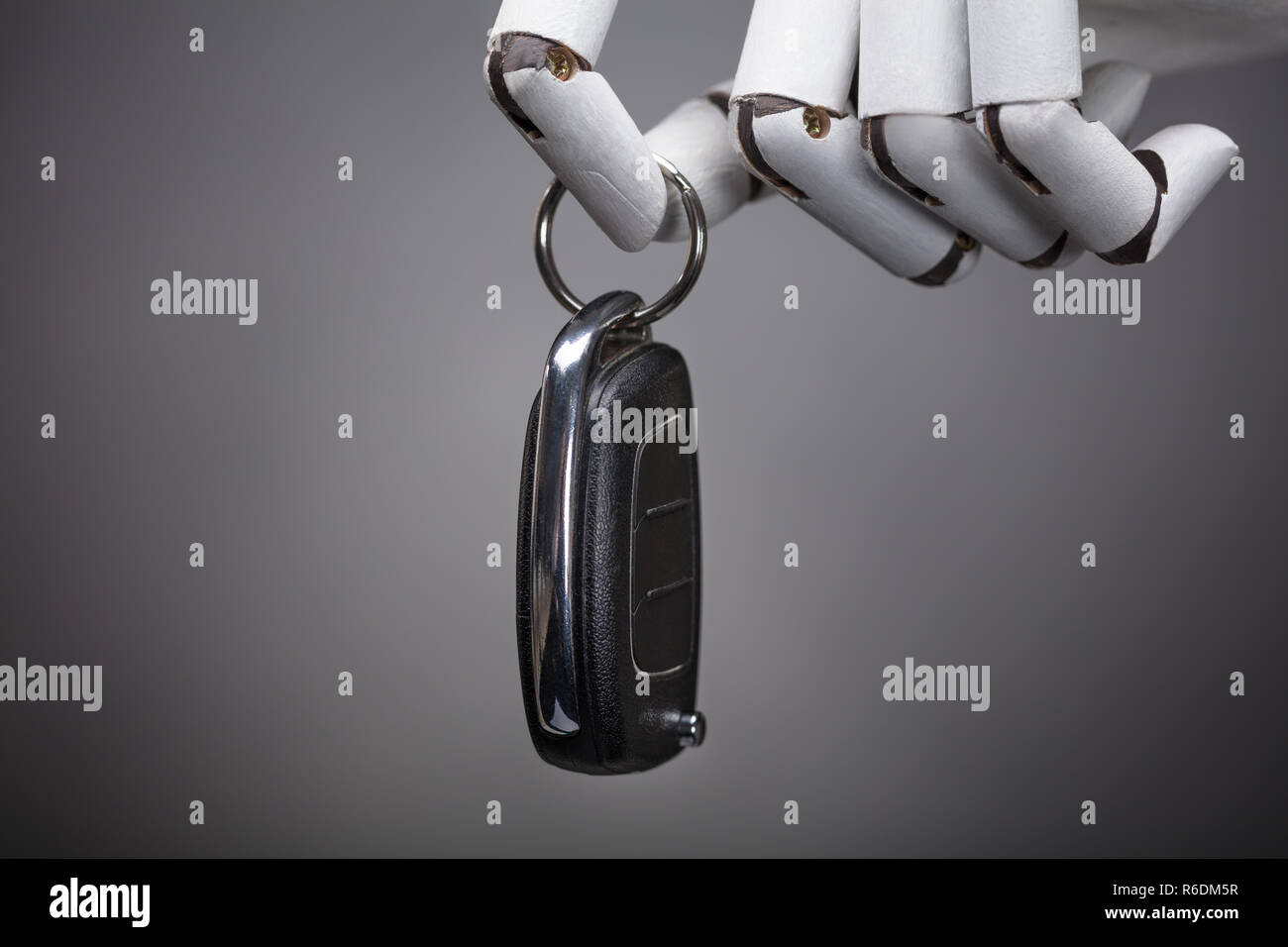 3d mechanic holding car hi-res stock photography and images - Alamy