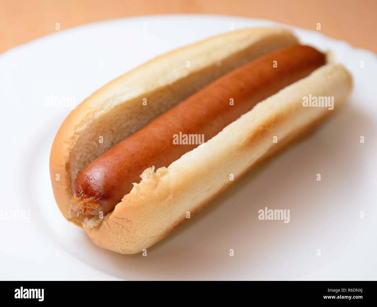 Hot dog in a plain bun Stock Photo Alamy