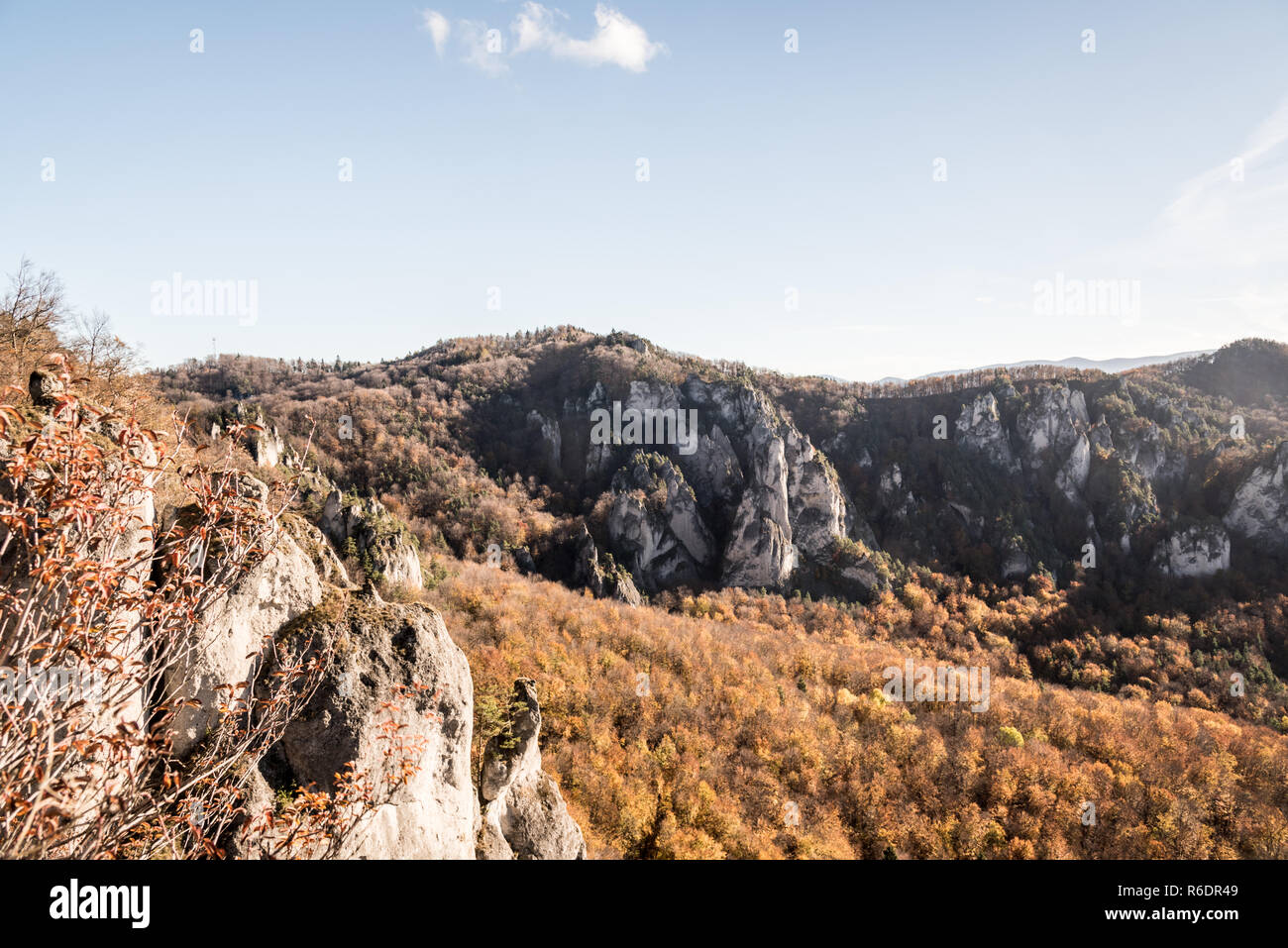 Sulovske skaly mountains in Slovakia with rocks, colorful forest and blue sky during nice autumn day Stock Photo