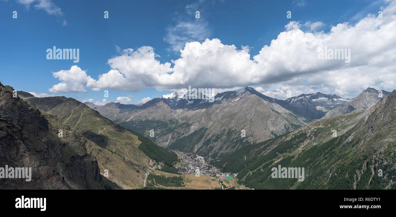 Panorama of mountain valley with Saas Fee, Valais, Switzerland. Stock Photo