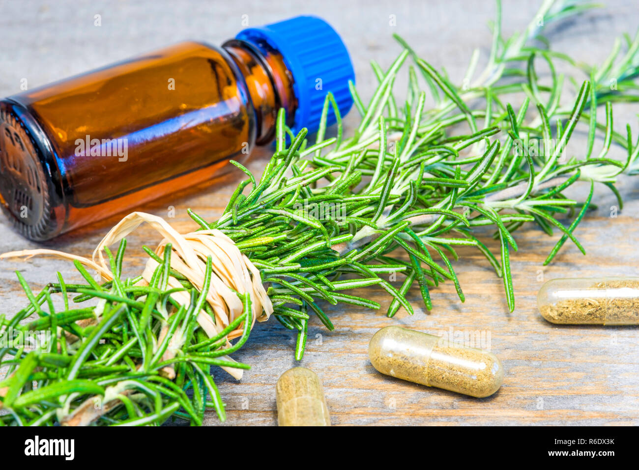 Rosemary With Tincture Stock Photo Alamy