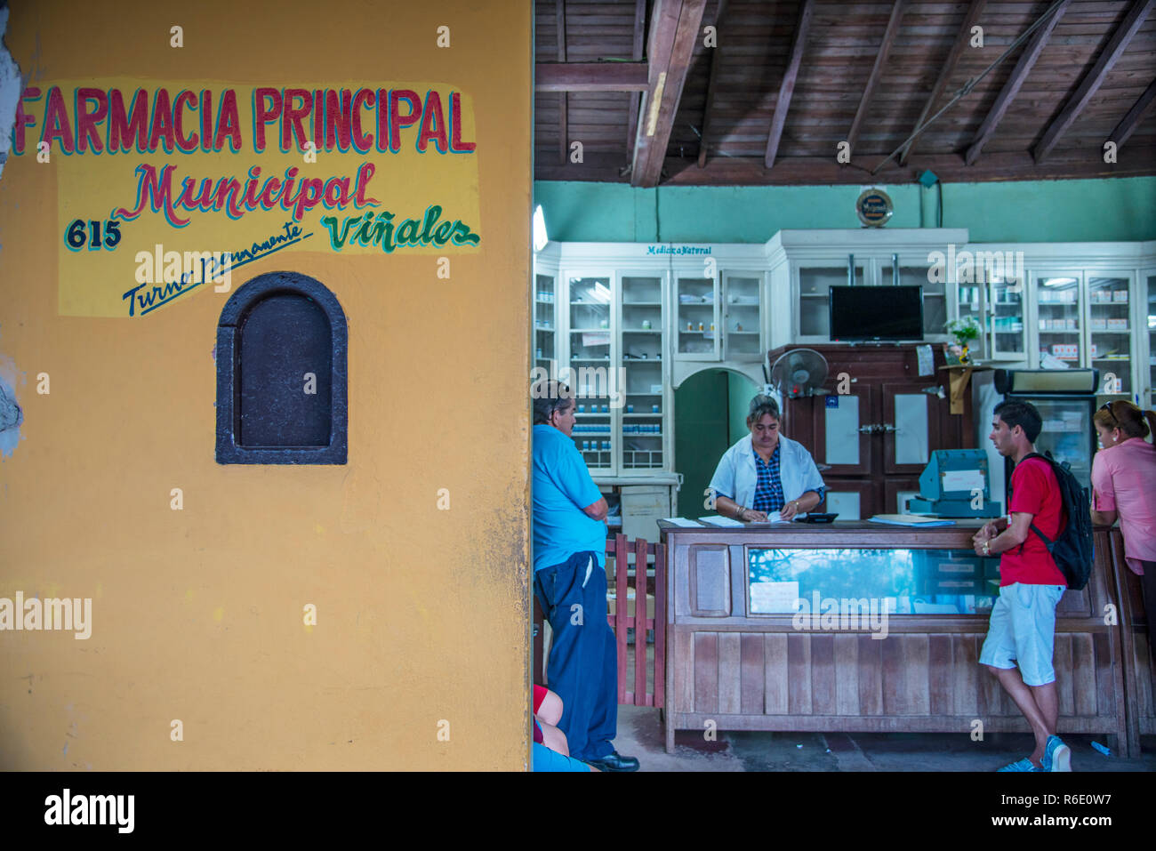 People at a Cuban pharmacy in Viñales. Stock Photo