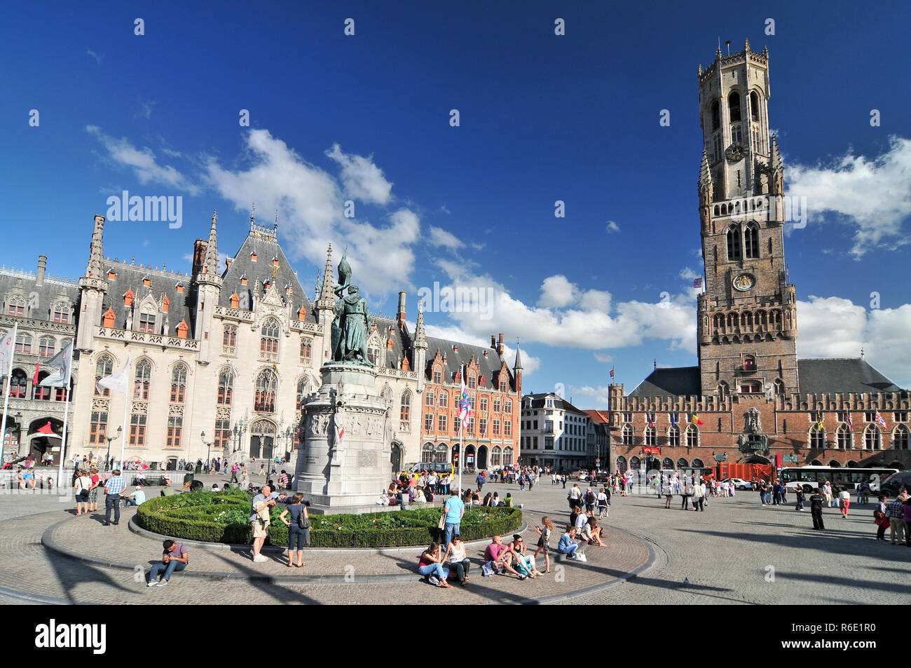 Statue Of Jan Breydel And Pieter De Coninck And Famouse Medieval Belfry Belfort Of Bruges At Grote Markt Square Belgium Stock Photo