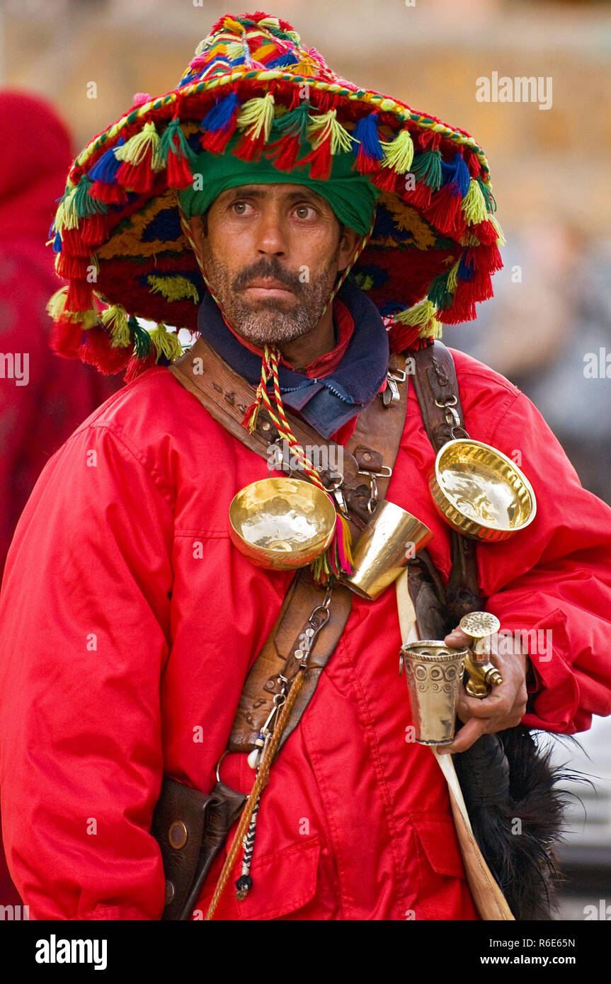 Moroccan water seller in traditional hires stock photography and