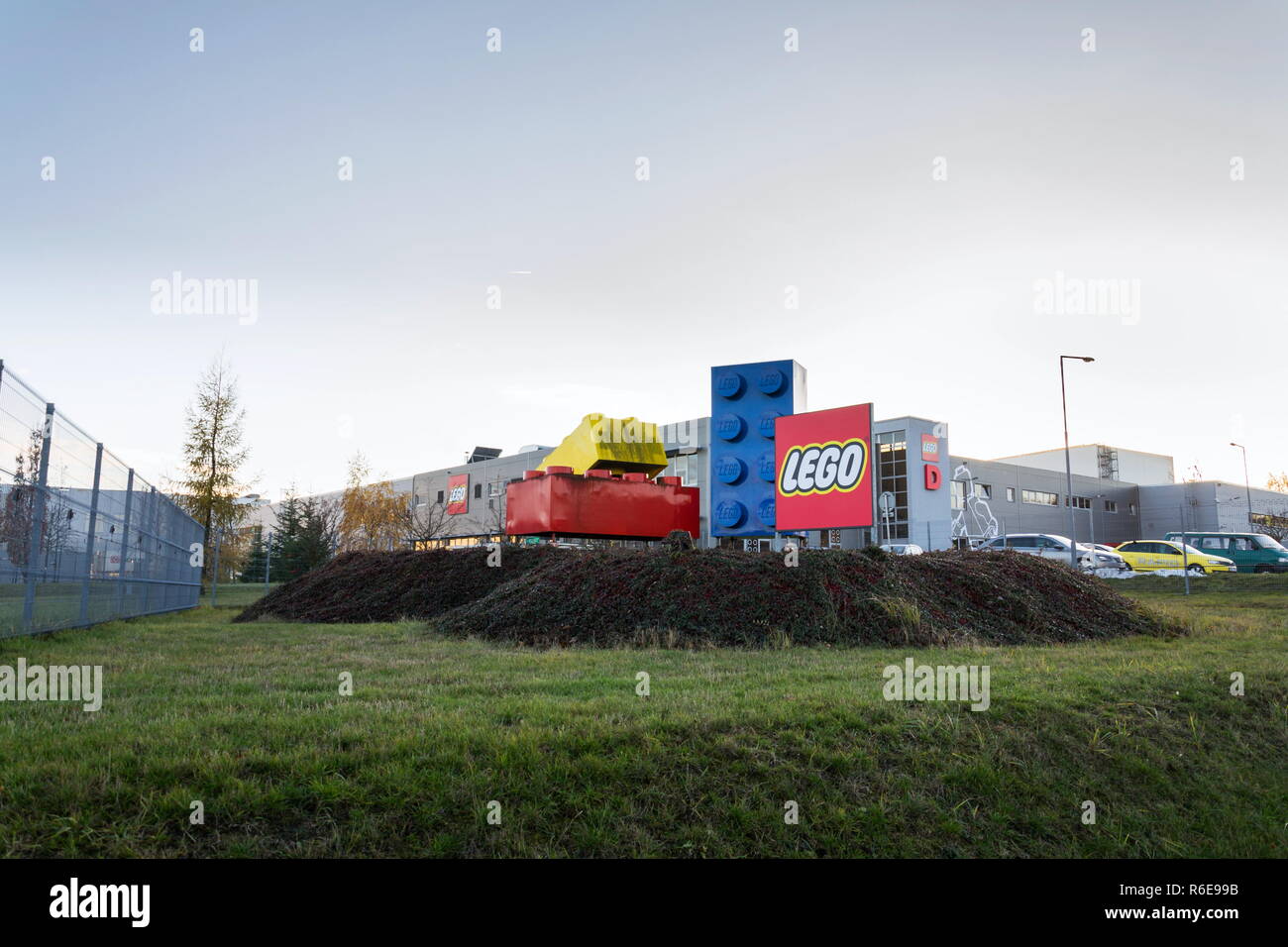 KLADNO, CZECH REPUBLIC - DECEMBER 4 2018: Giant Lego bricks in front of the Lego Group company logo production plant on December 4, 2018 in Kladno, Cz Stock Photo