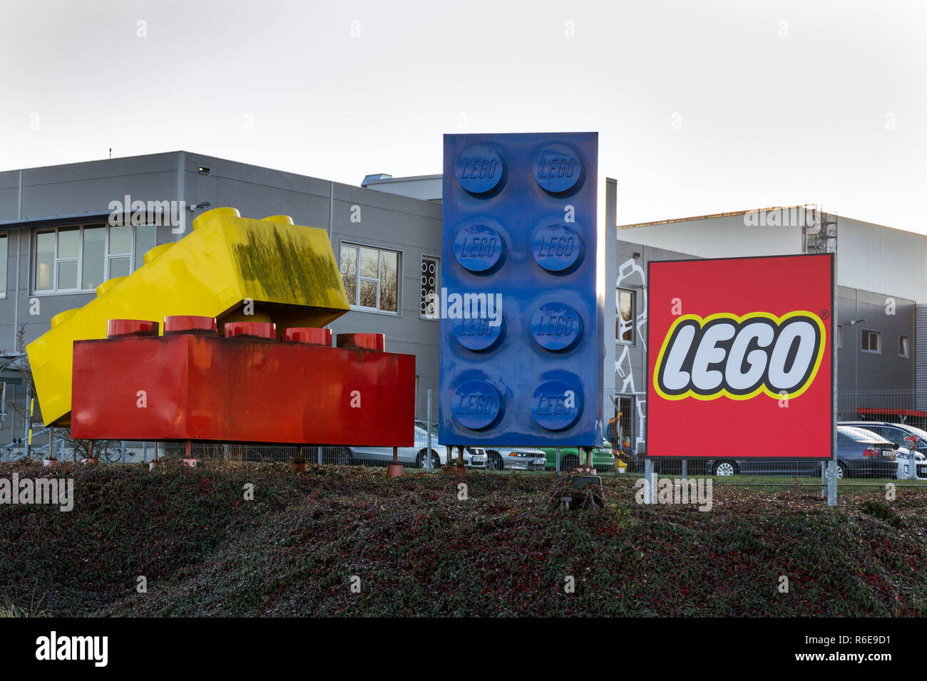 KLADNO, CZECH REPUBLIC - DECEMBER 4 2018: Giant Lego bricks in front of the Lego Group company logo production plant on December 4, 2018 in Kladno, Cz Stock Photo