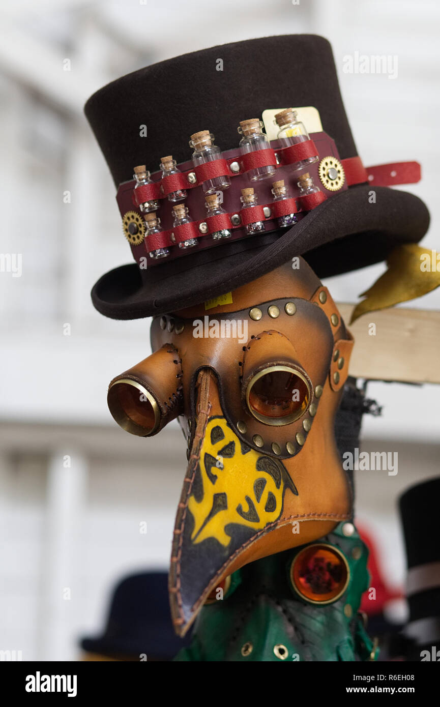 Decorative Steampunk Top Hat and leather mask with googles at a steampunk  market Stock Photo - Alamy