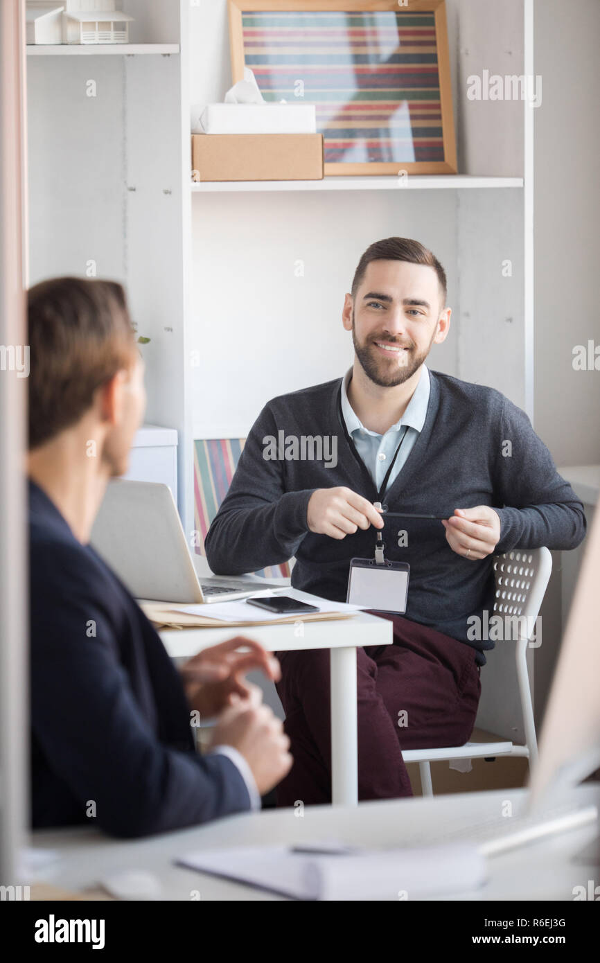 Colleagues Talking in Office Stock Photo