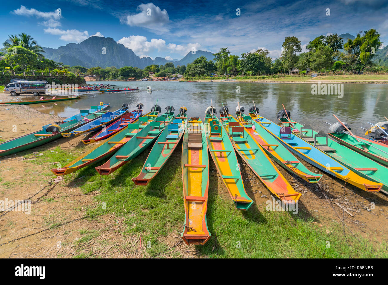 Long Tail Boats On Song River In Vang Vieng, Laos Stock Photo