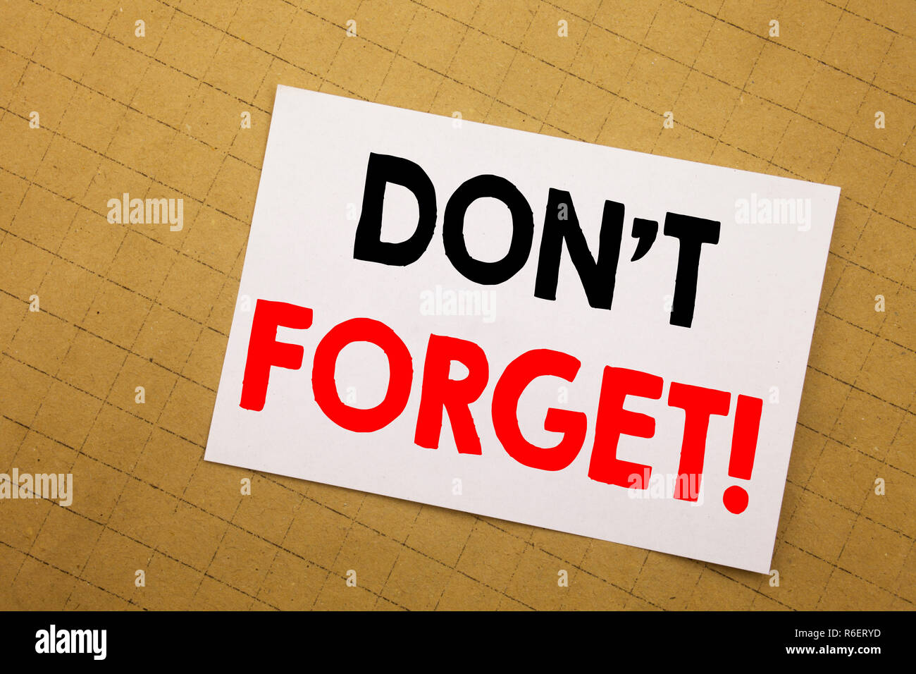 Conceptual hand writing text caption inspiration showing Do Not Forget. Business concept for Reminder Message Written on sticky note yellow background. Stock Photo