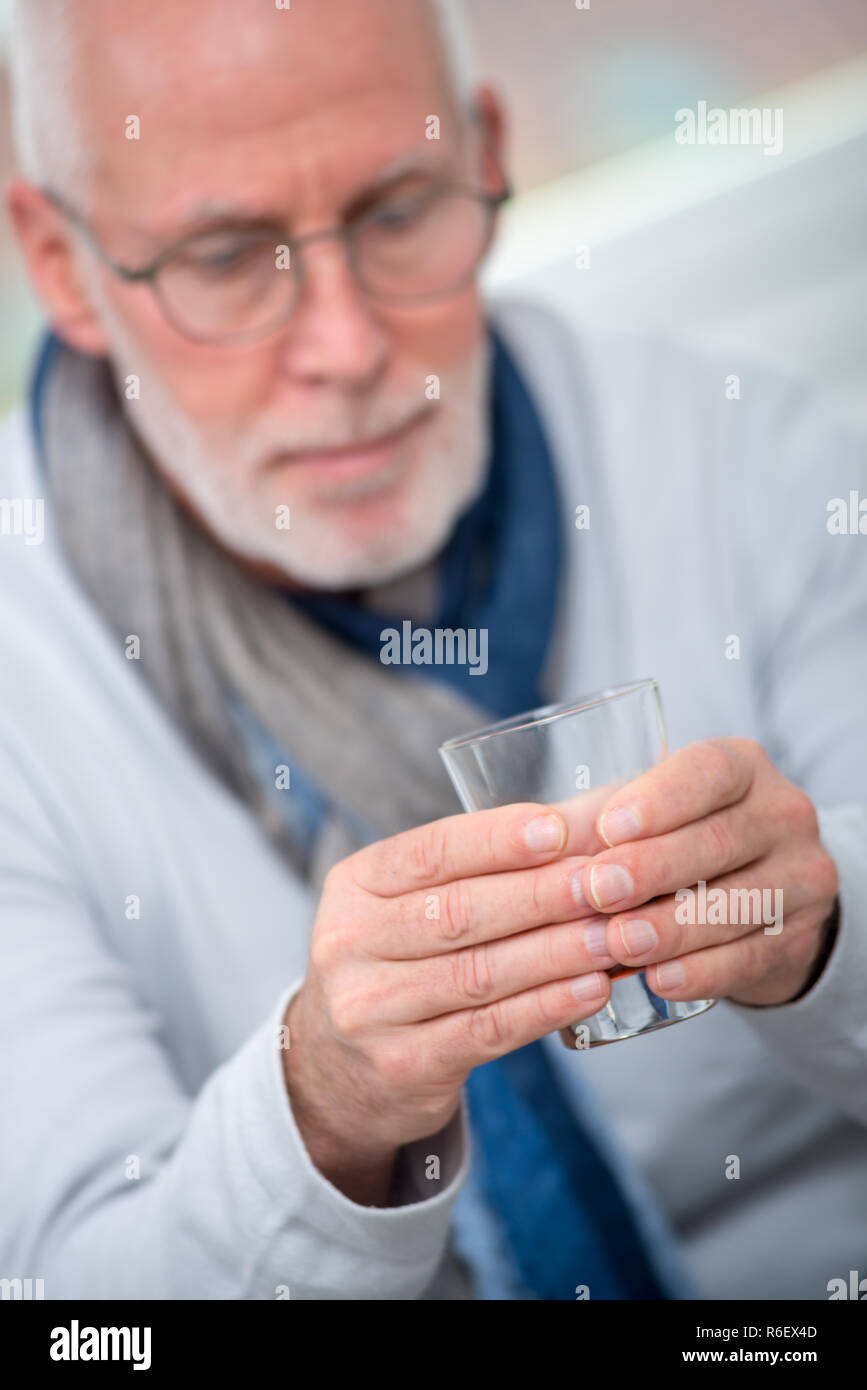 alcohol and beverage concept - older man smelling red wine Stock Photo ...