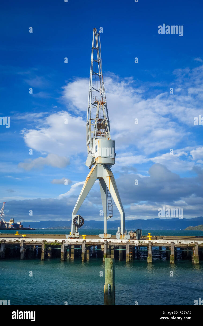 Crane in Wellington harbour docks, New Zealand Stock Photo Alamy