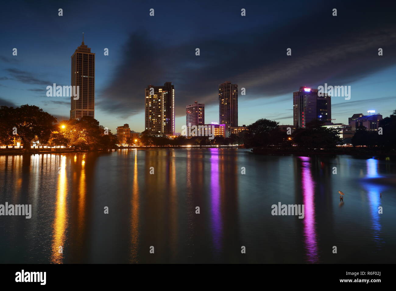 the skyline of colombo with reflection in the lake at night Stock Photo ...