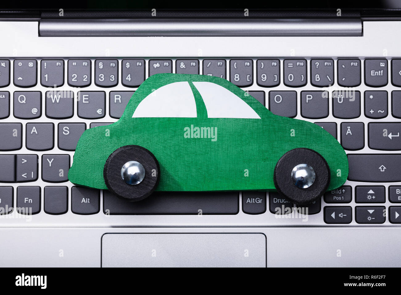 Green Car On Laptop Keypad Stock Photo Alamy