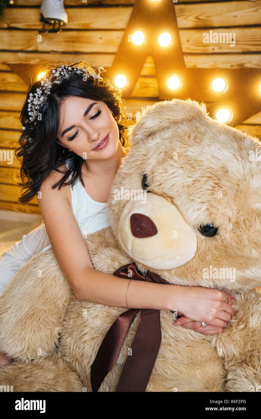 beautiful young happy woman in a festive mood waiting for new year ...