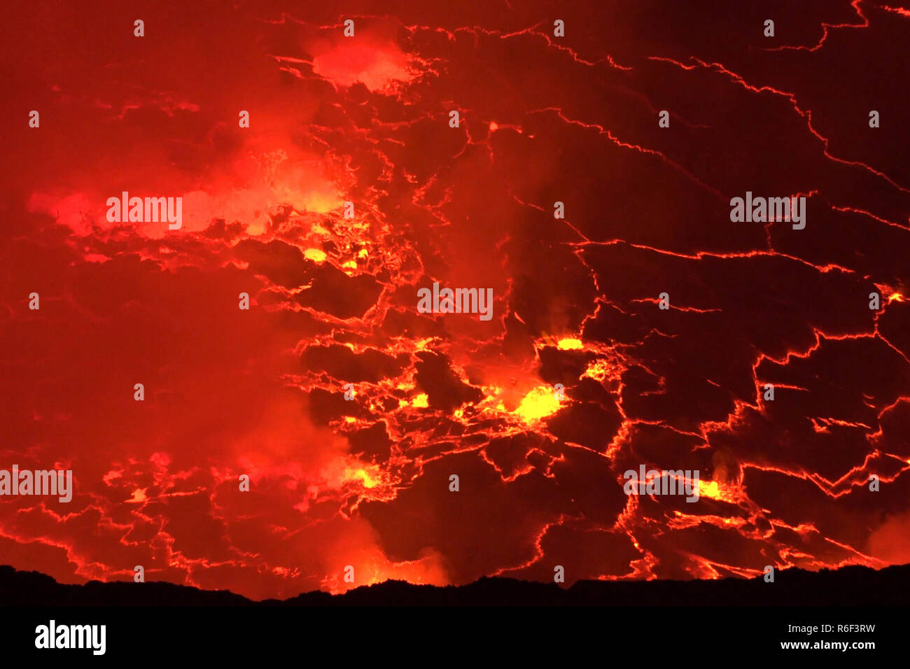 Mouth of the volcano with magma. Molten magma in the muzzle Stock Photo -  Alamy, image size:1300x956