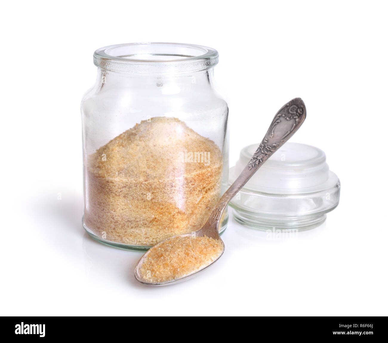 Gelatin or gelatine in the glass jar. On white background Stock Photo