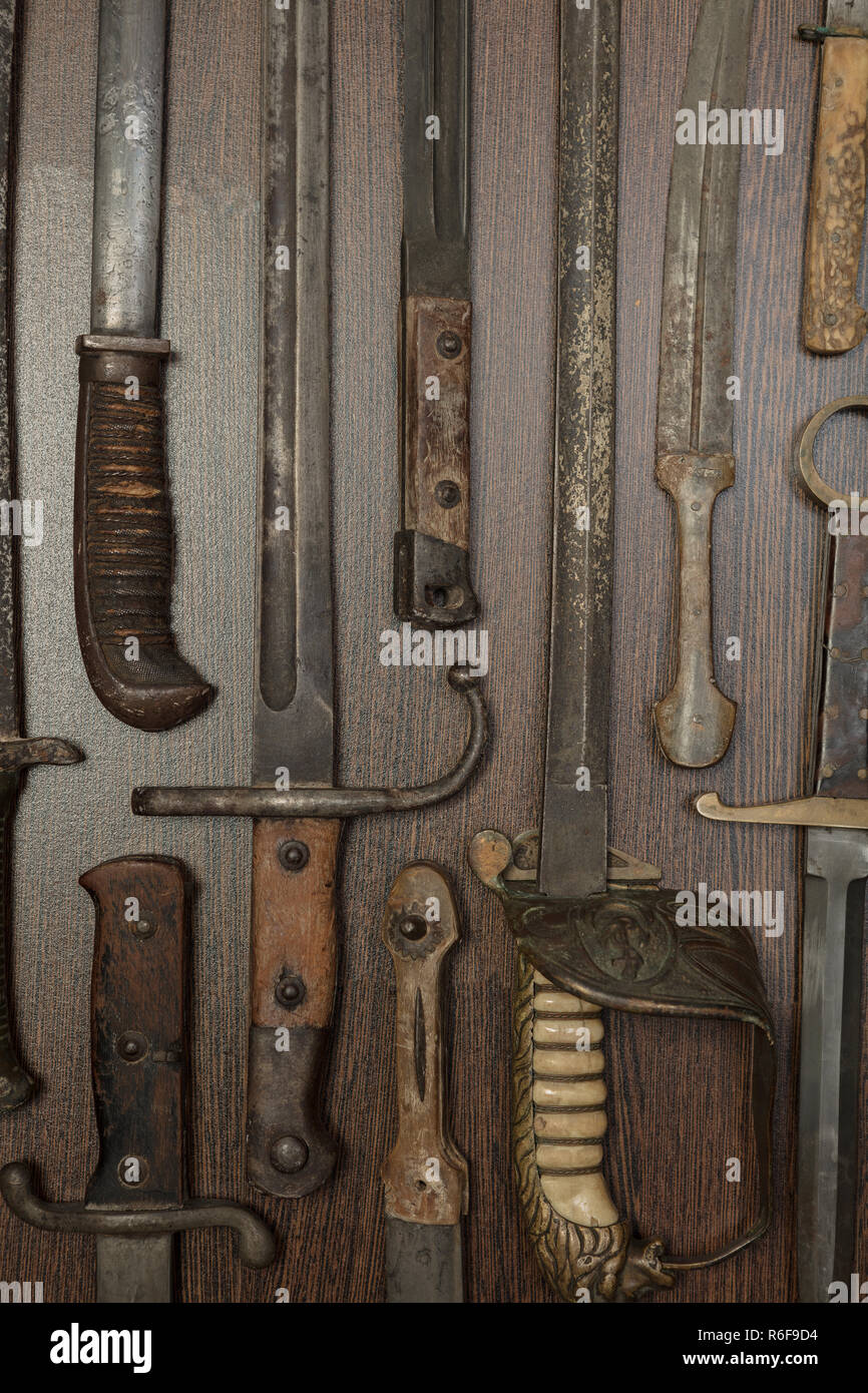 Display case with old historical swords Stock Photo Alamy