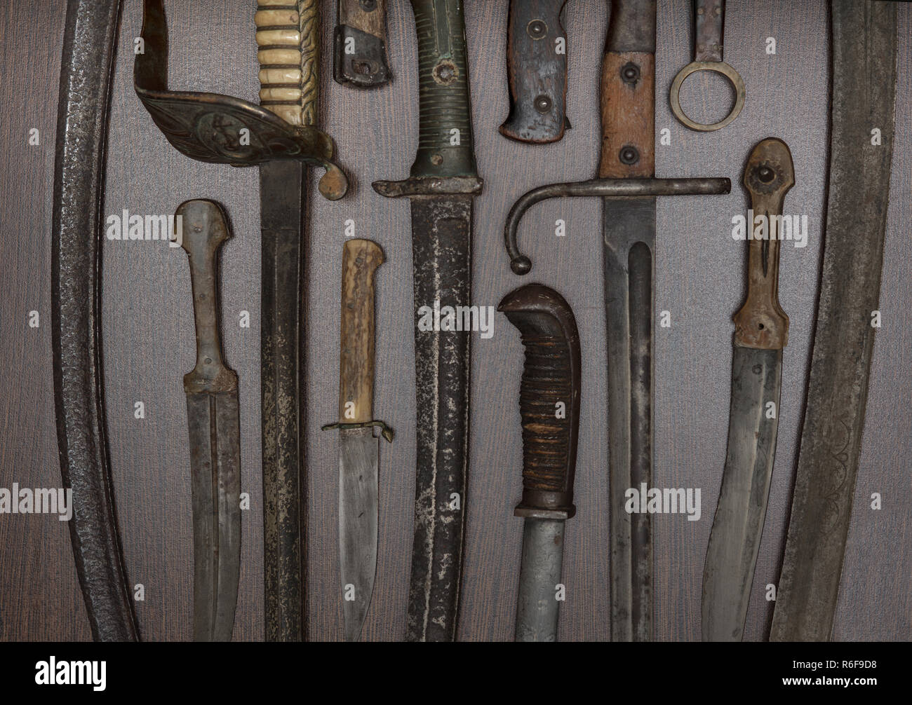 Armoury display of historic swords and daggers Stock Photo