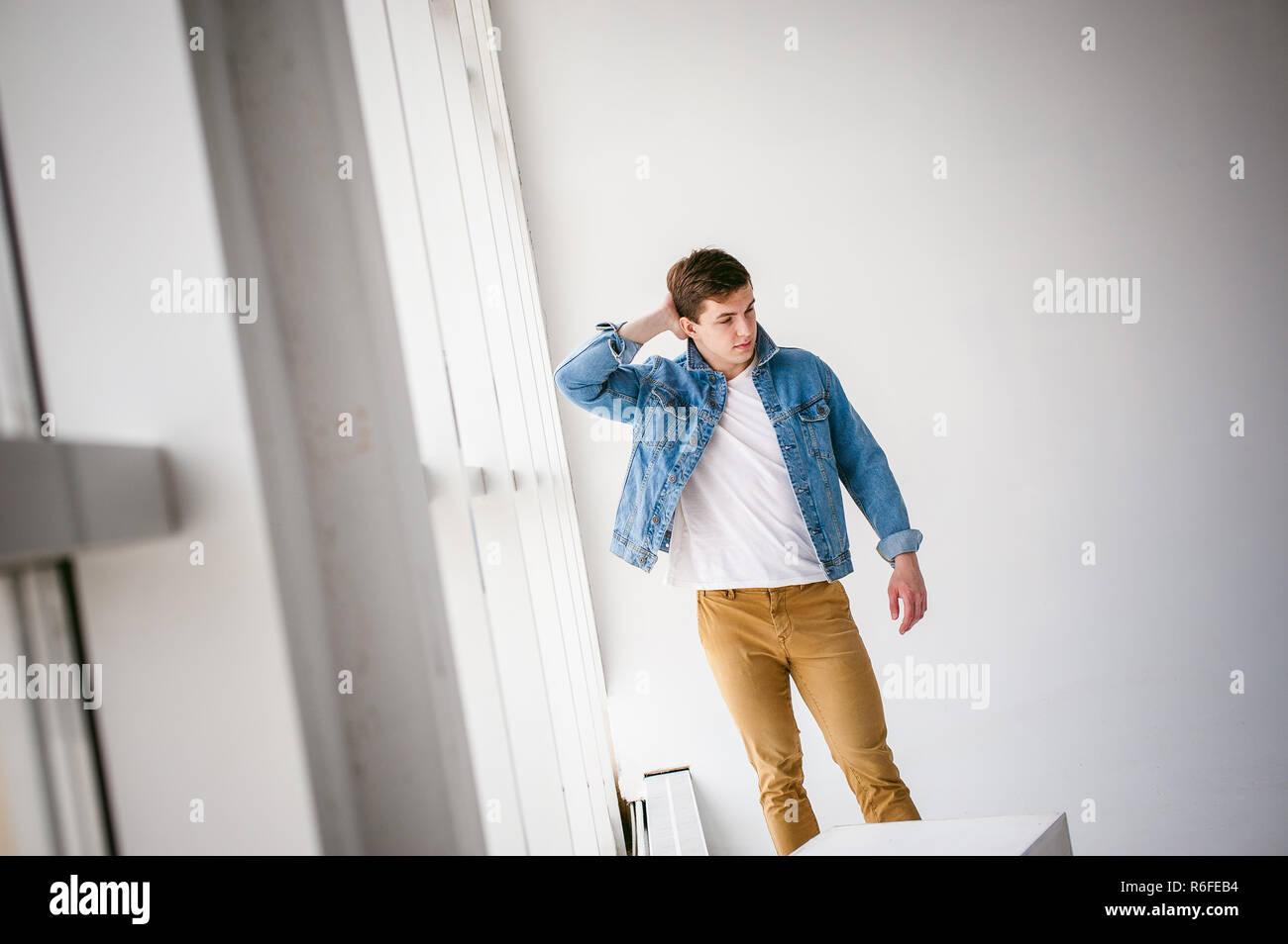 white t shirt and light blue jeans