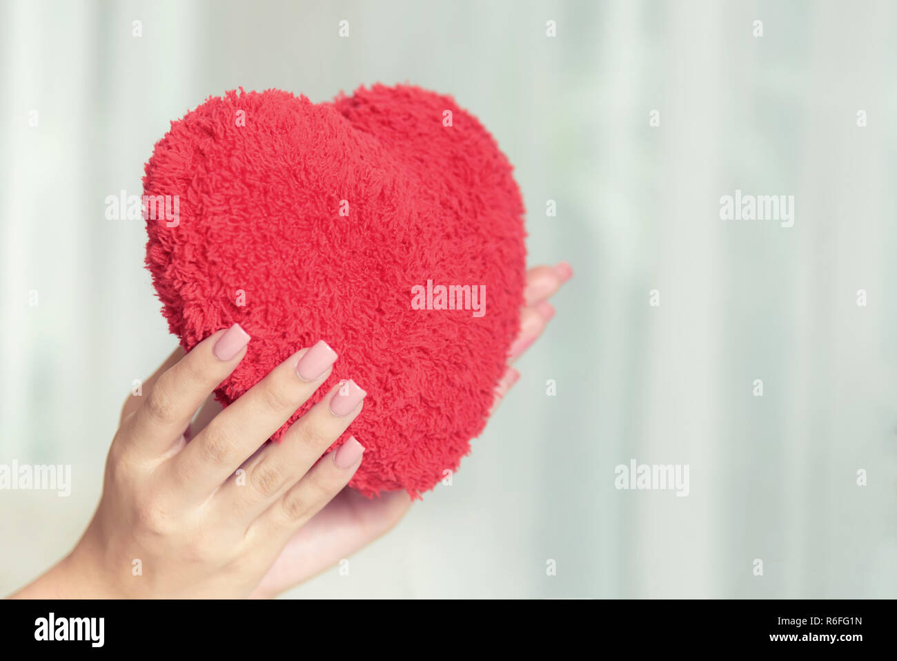 hand holding red heart, love and valentine concept Stock Photo - Alamy