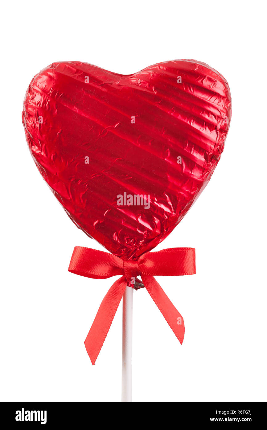 Red Chocolate love heart lollypop isolated Stock Photo Alamy