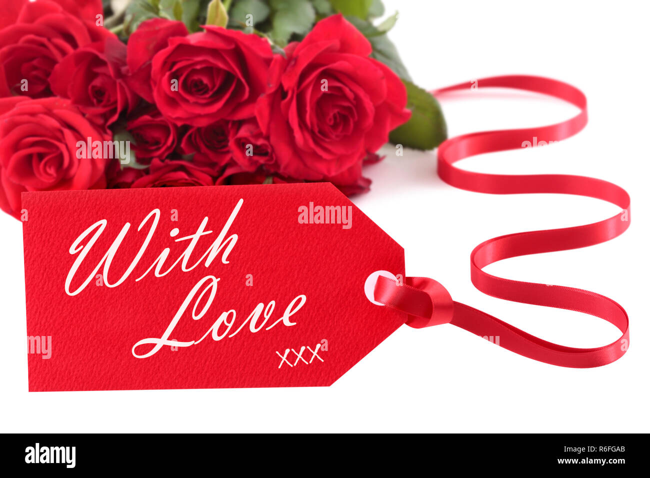Valentine roses with red gift tag and love message Stock Photo - Alamy