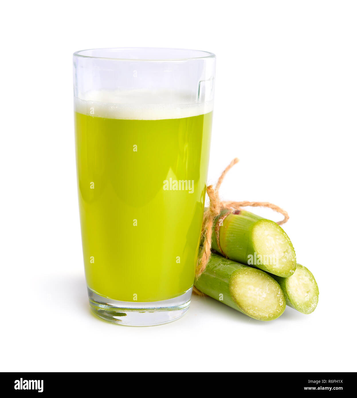Sugar cane fresh juice isolated on white background Stock Photo Alamy