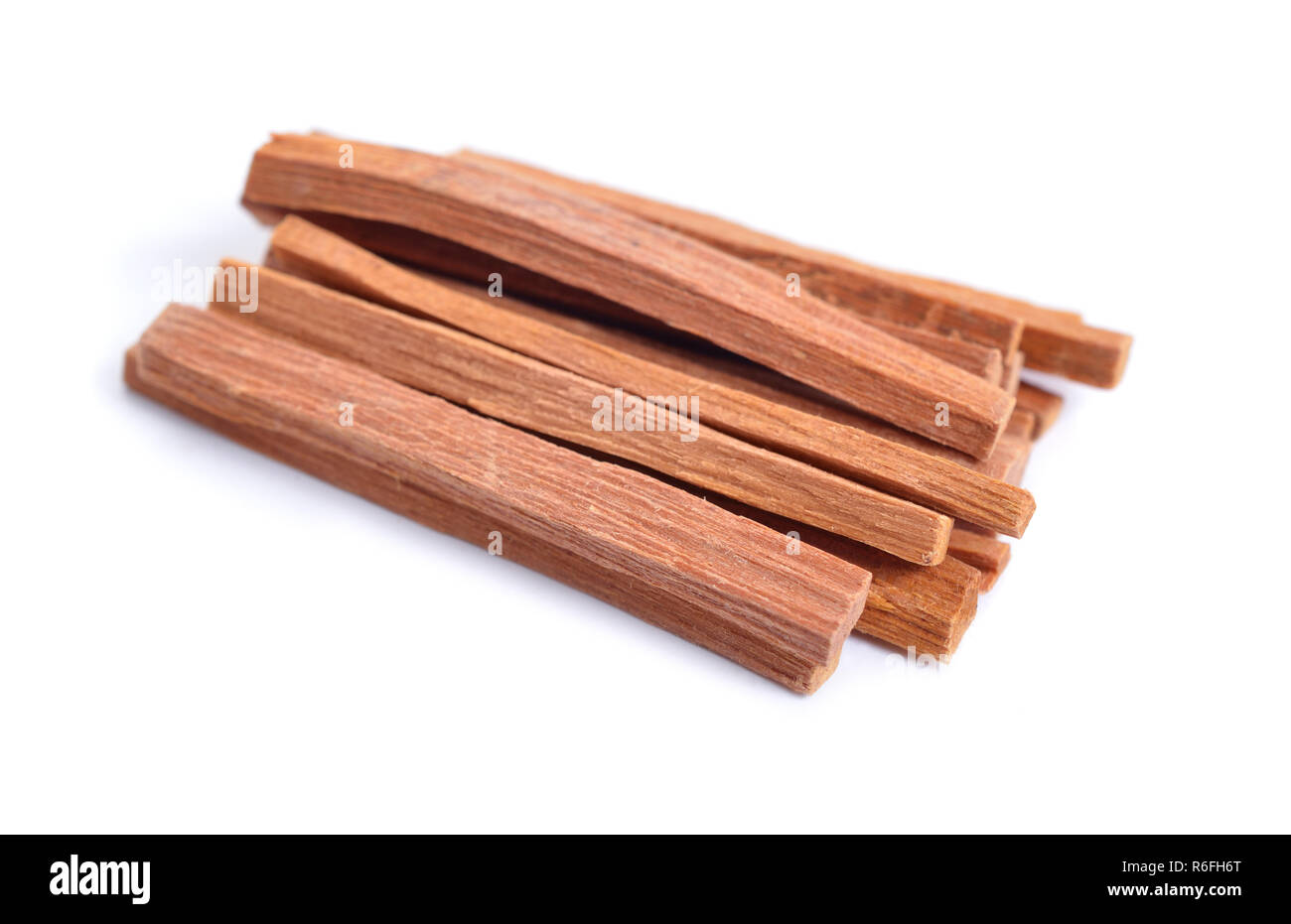 Chandan or sandalwood sticks isolated on white background. Stock Photo