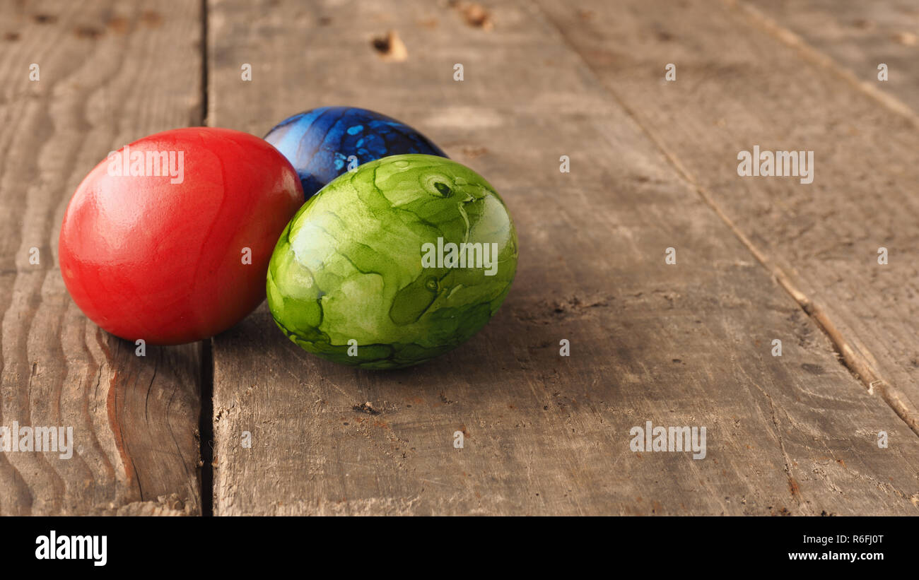colored easter eggs on wood Stock Photo
