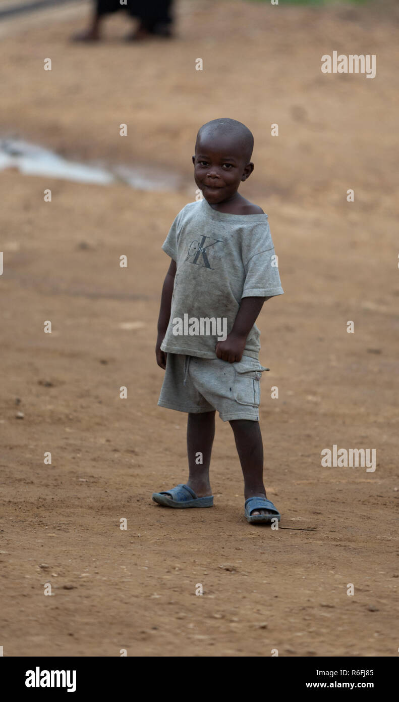 Little boy in a Calvin Klein T-shirt, Uganda Stock Photo