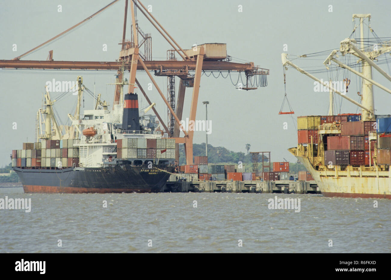 Shipping, Containers loading at Port, Nava Seva Stock Photo - Alamy