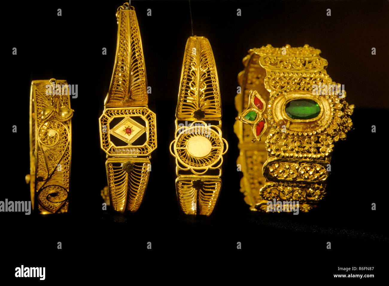 23 carat antique gold jewelry on black background Stock Photo - Alamy