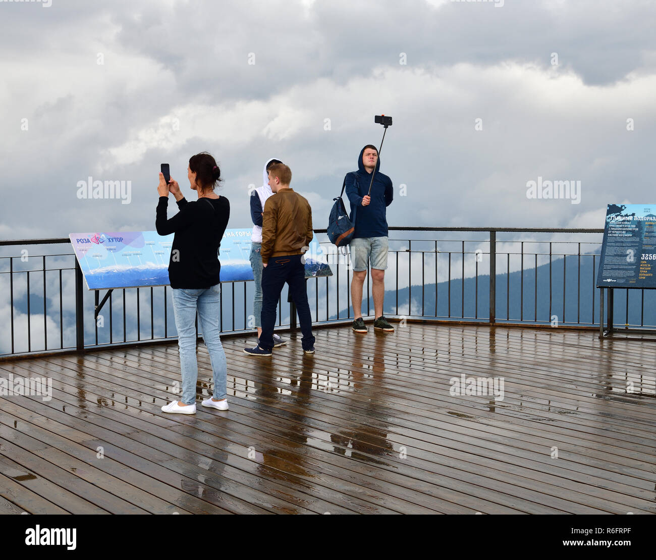 Sochi, Russia - June 1. 2018. Tourists on observation deck Rose Peak at altitude of 2320 meters Stock Photo