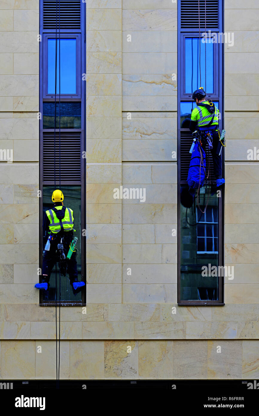 Newcastle city centre tall building window cleaners Stock Photo Alamy