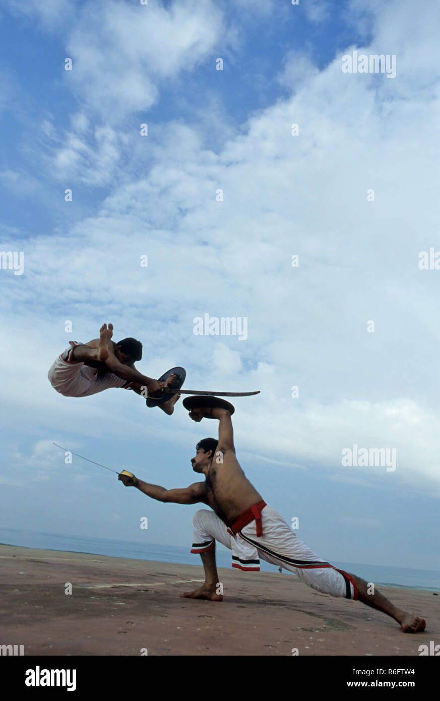 Kalaripayattu, Ancient Martial Art of Kerala, sword and shield fighting, Kerala India Asia Indian Asian MR#777B Stock Photo