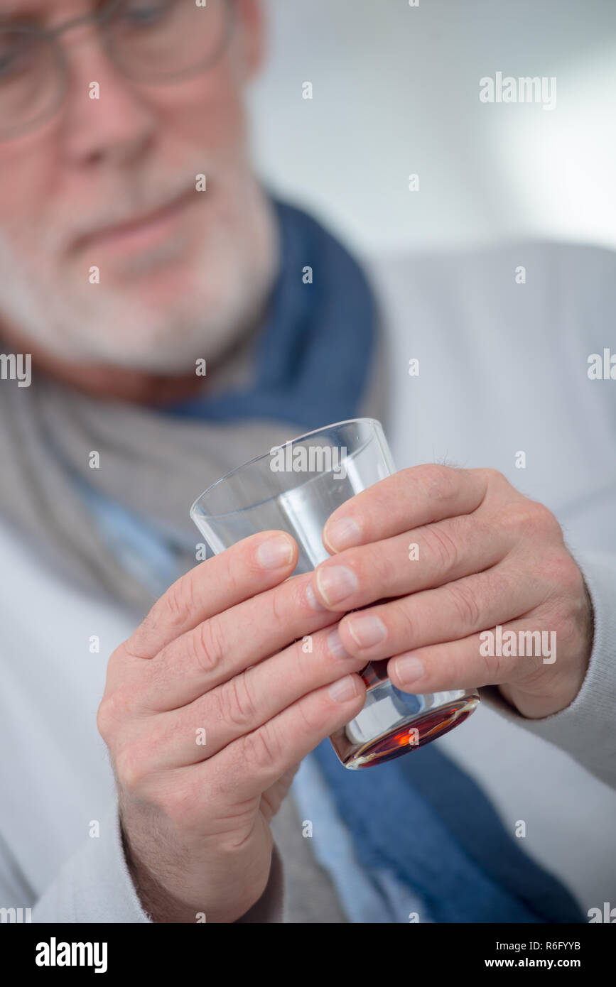 alcohol and beverage concept - older man smelling red wine Stock Photo ...