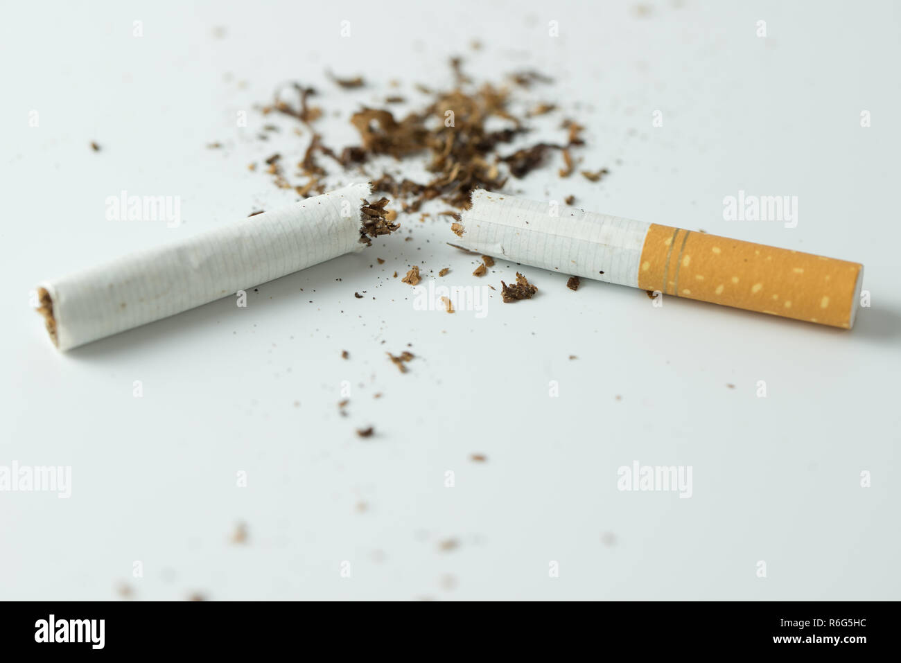 Quit smoking concept by breaking the cigarette Stock Photo