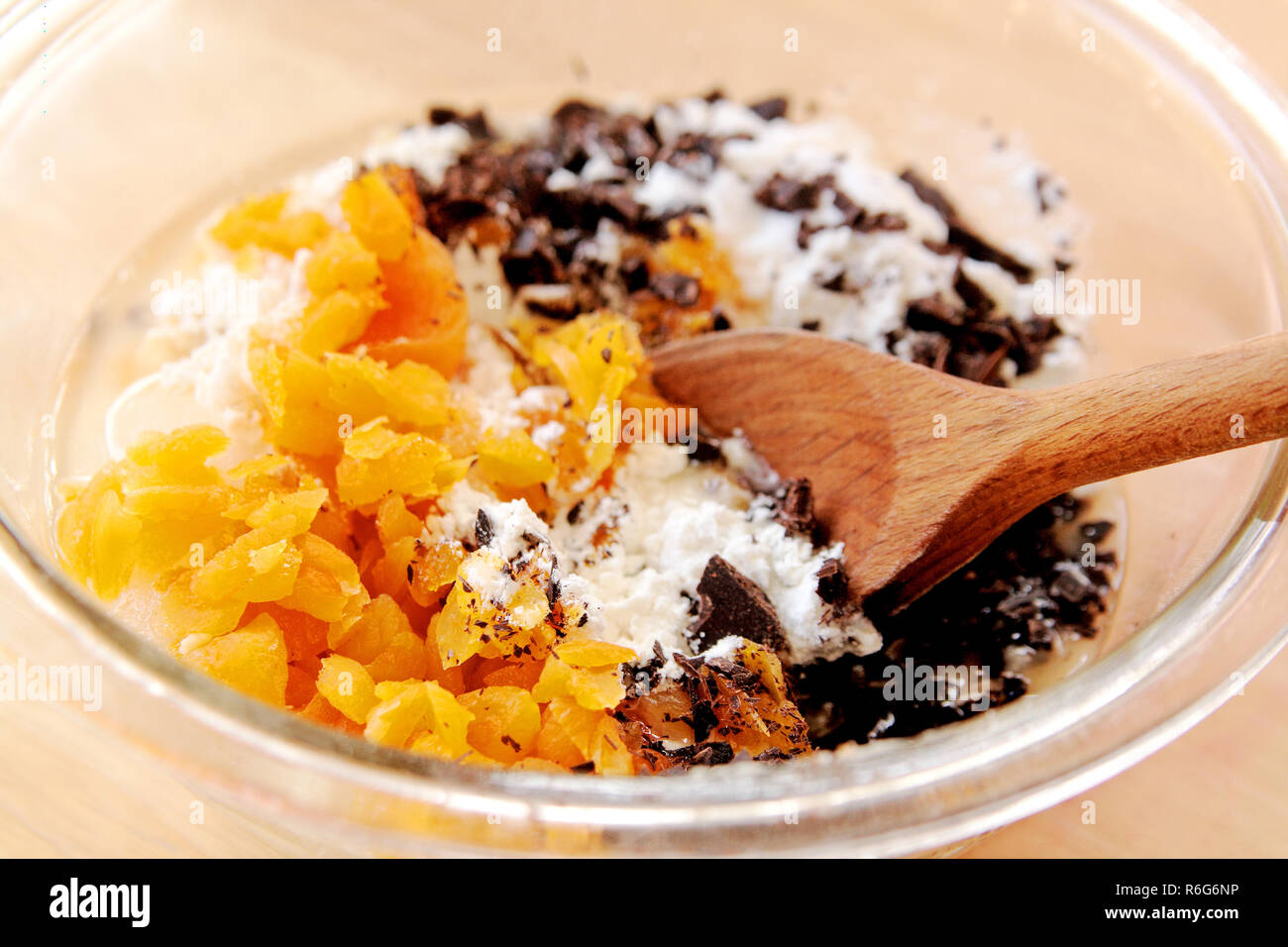 Dark chocolate with dried apricots batter Stock Photo Alamy