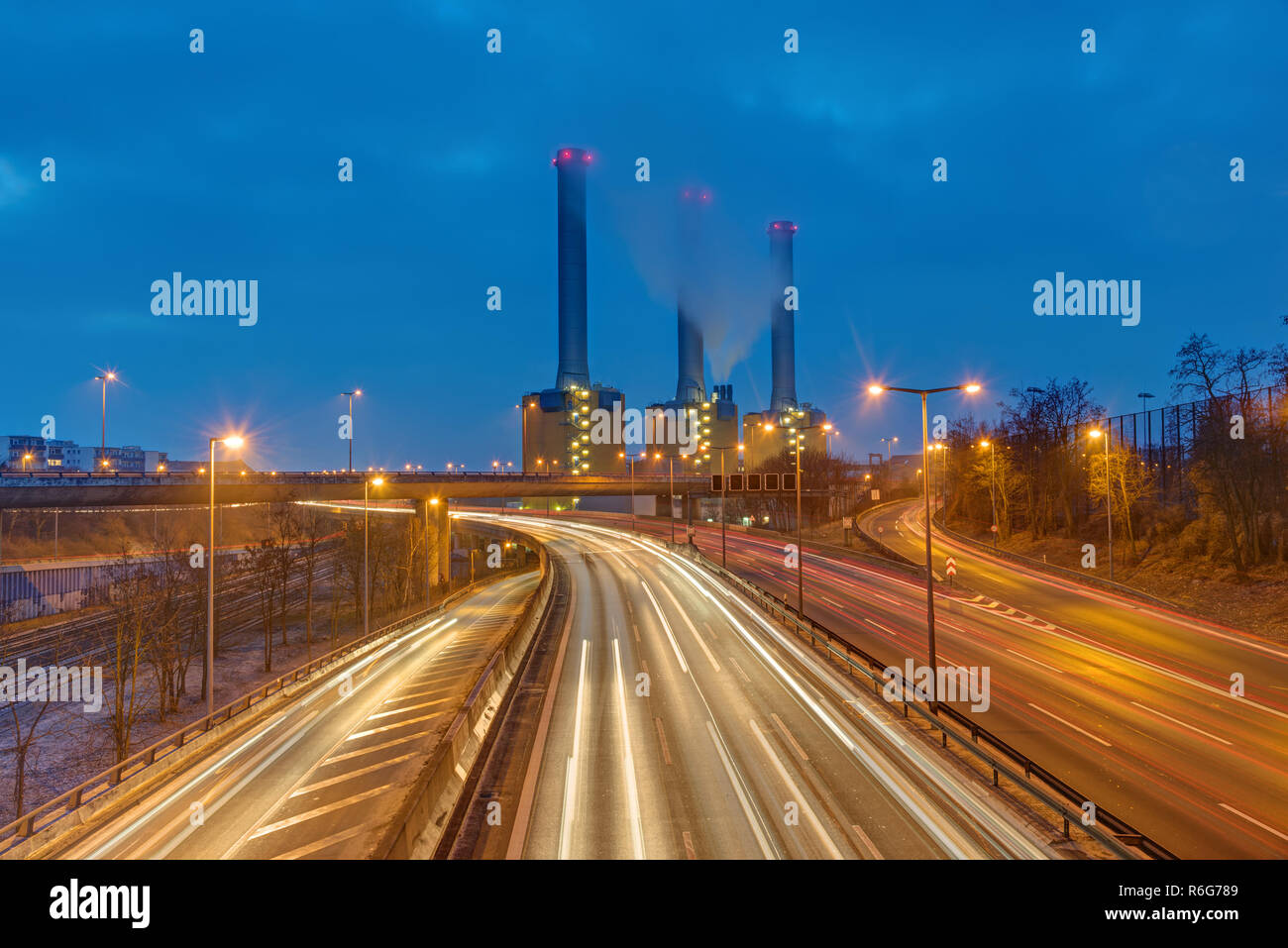power plant and highway in berlin at night Stock Photo
